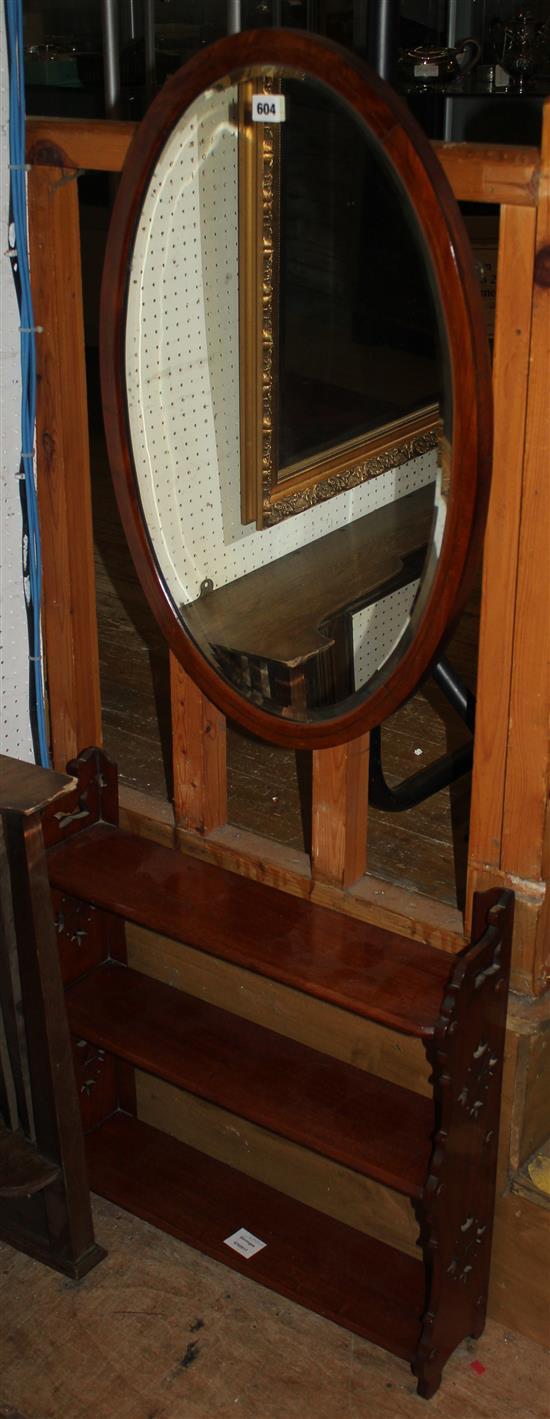 Victorian three tier wall bracket and an Edwardian inlaid mahogany oval wall mirror